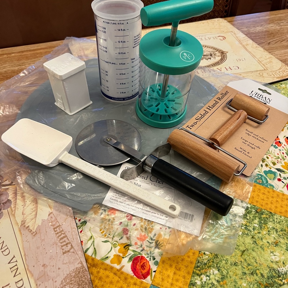 The Pampered Chef Teal and White Cooking Tool Collection